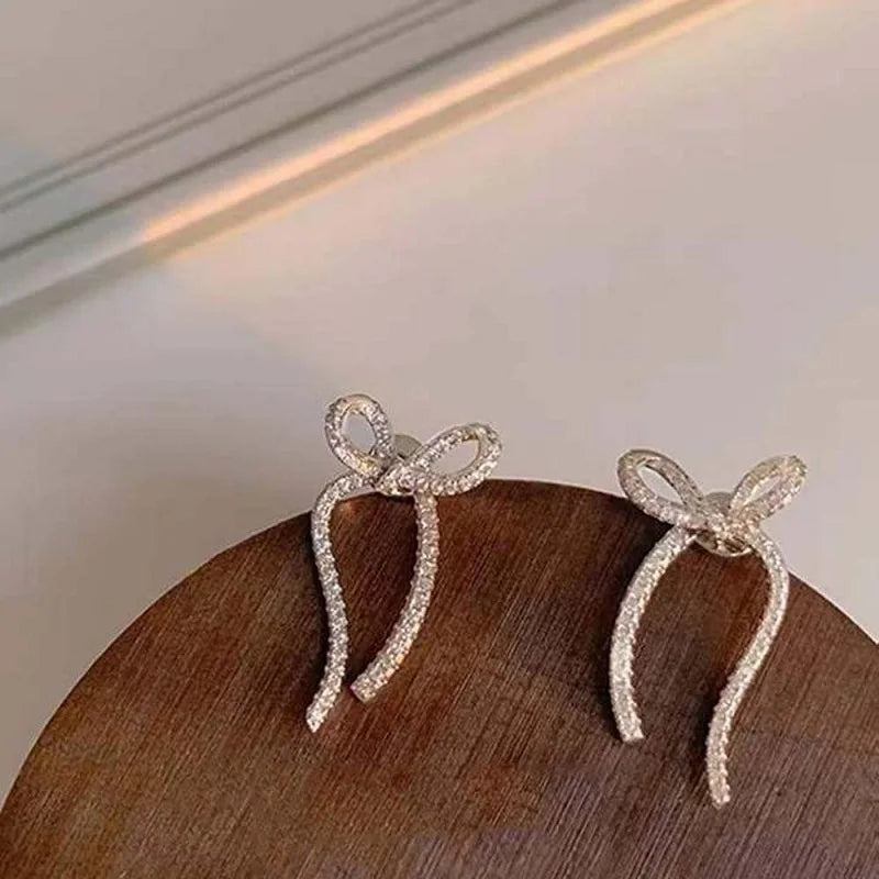 Silver Rhinestone Bow Drop Earrings